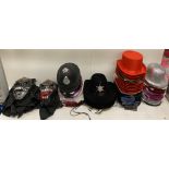 Contents to 2 boxes - 110 assorted fancy dress hats (police, sheriff etc), masks,
