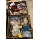 Contents to two wooden drawers - assorted car parts including oil filters, lenses, bulbs, wiring,