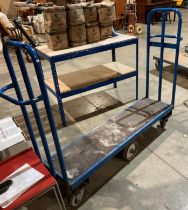 Thin blue metal mobile stock trolley,