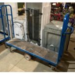 Thin blue metal mobile stock trolley,