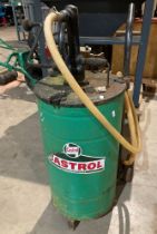 Castrol manual oil pump and barrel on a grey metal sack cart (wheels seized),