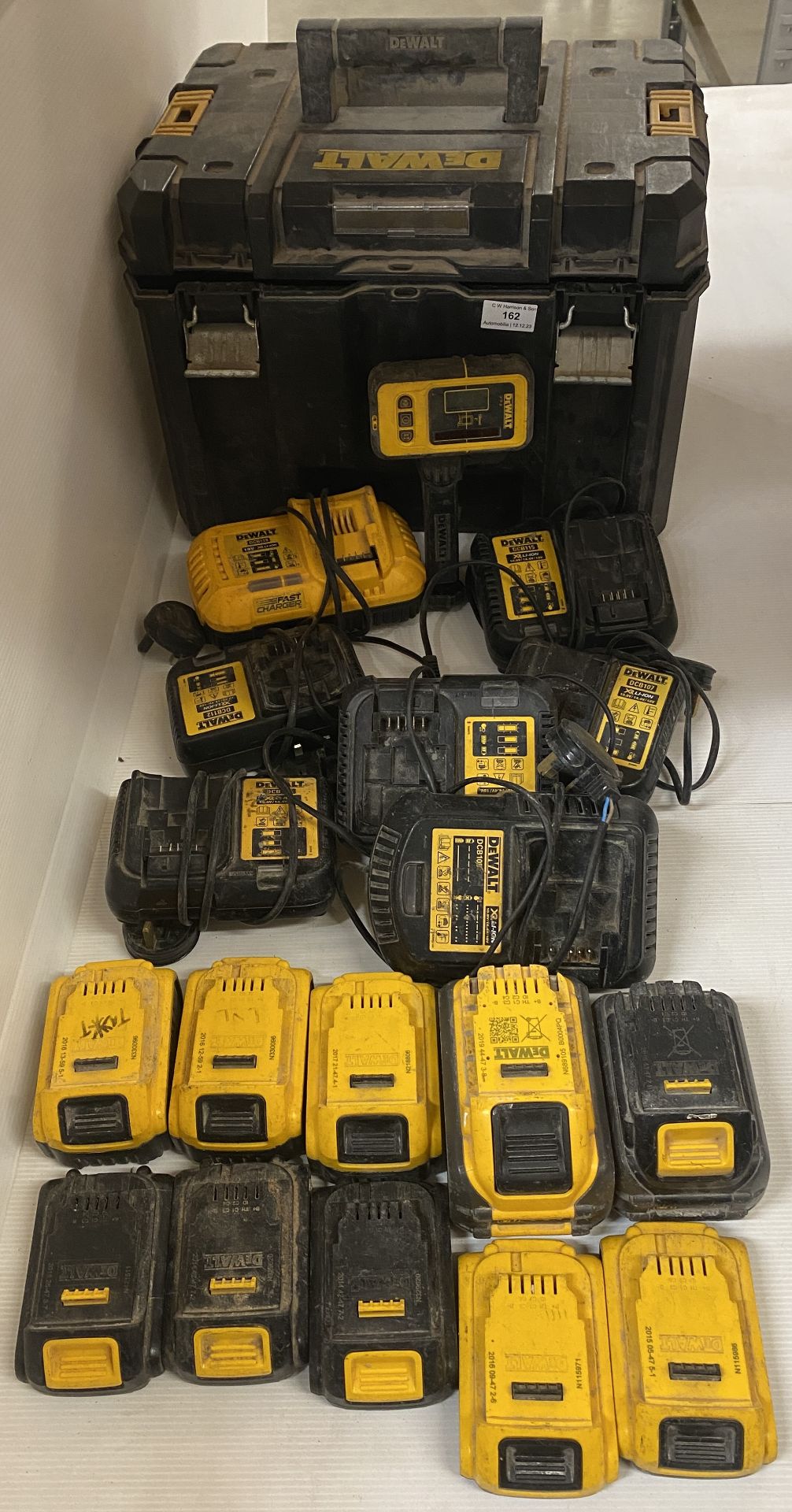 Contents to case - 6 x DeWalt battery chargers and 10 x assorted batteries (sold as seen) (saleroom
