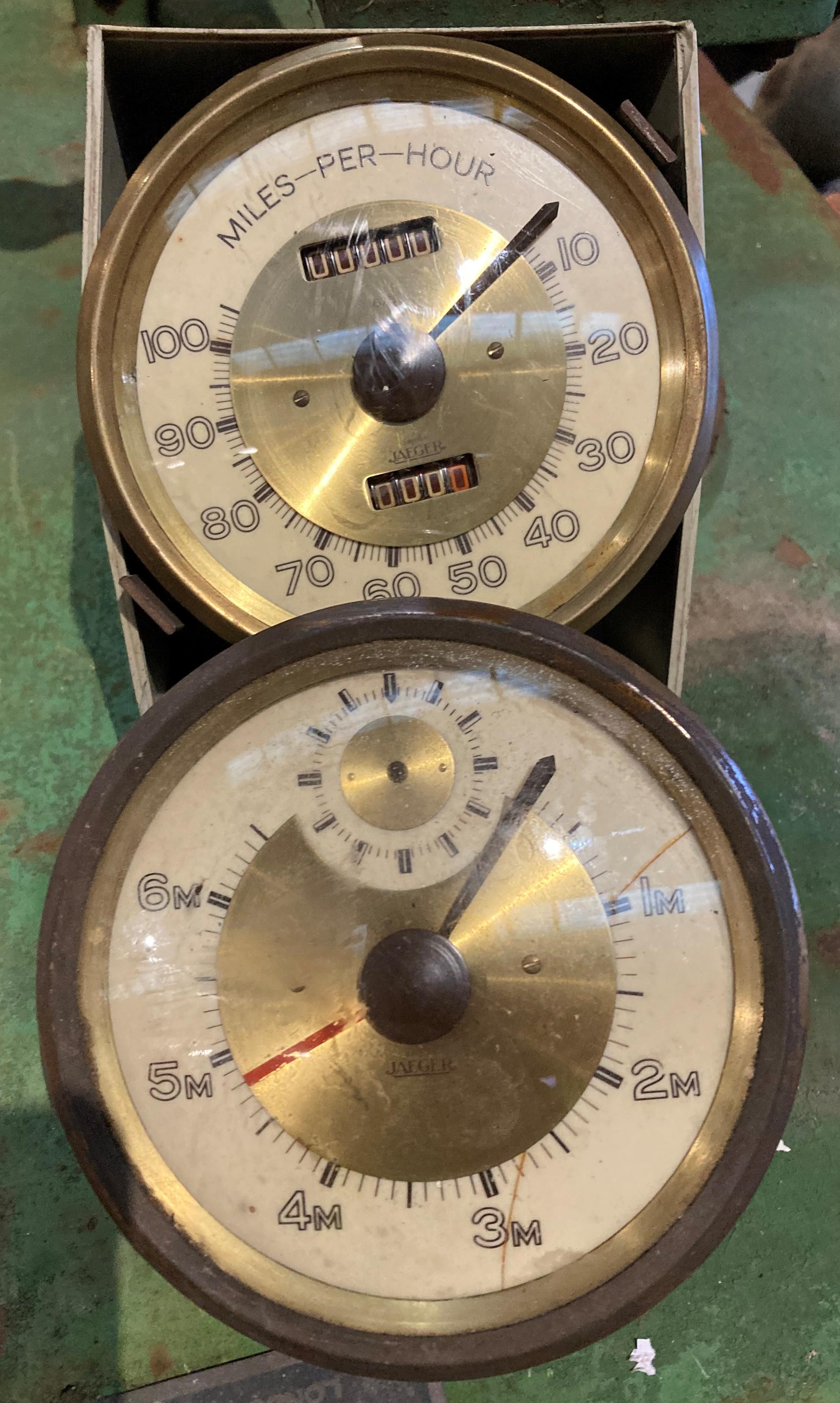 A vintage Jaeger speed and mileometer and matching rev counter/clock (saleroom location: MA1)