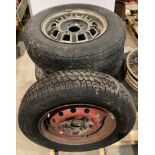 Set of four Dunlop MGB GT V8 wheels with used tyres Michelin 175 HR 14 XAS and steel wheel with a