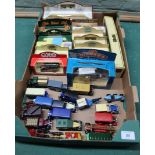 A box of mixed vehicles, Days Gone, Lledo etc, some boxed,