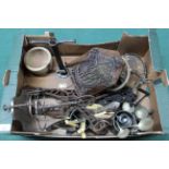 A box of mixed metalwares with odd wooden items including a set of scales and a private trade mark