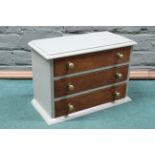 A small heavy oak three drawer chest with painted outer, stands 24.