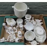 Two boxes of blanc de chine wares including a three branch candlestick etc
