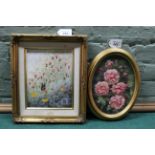 Two small framed oil paintings on board, a small oval of roses,