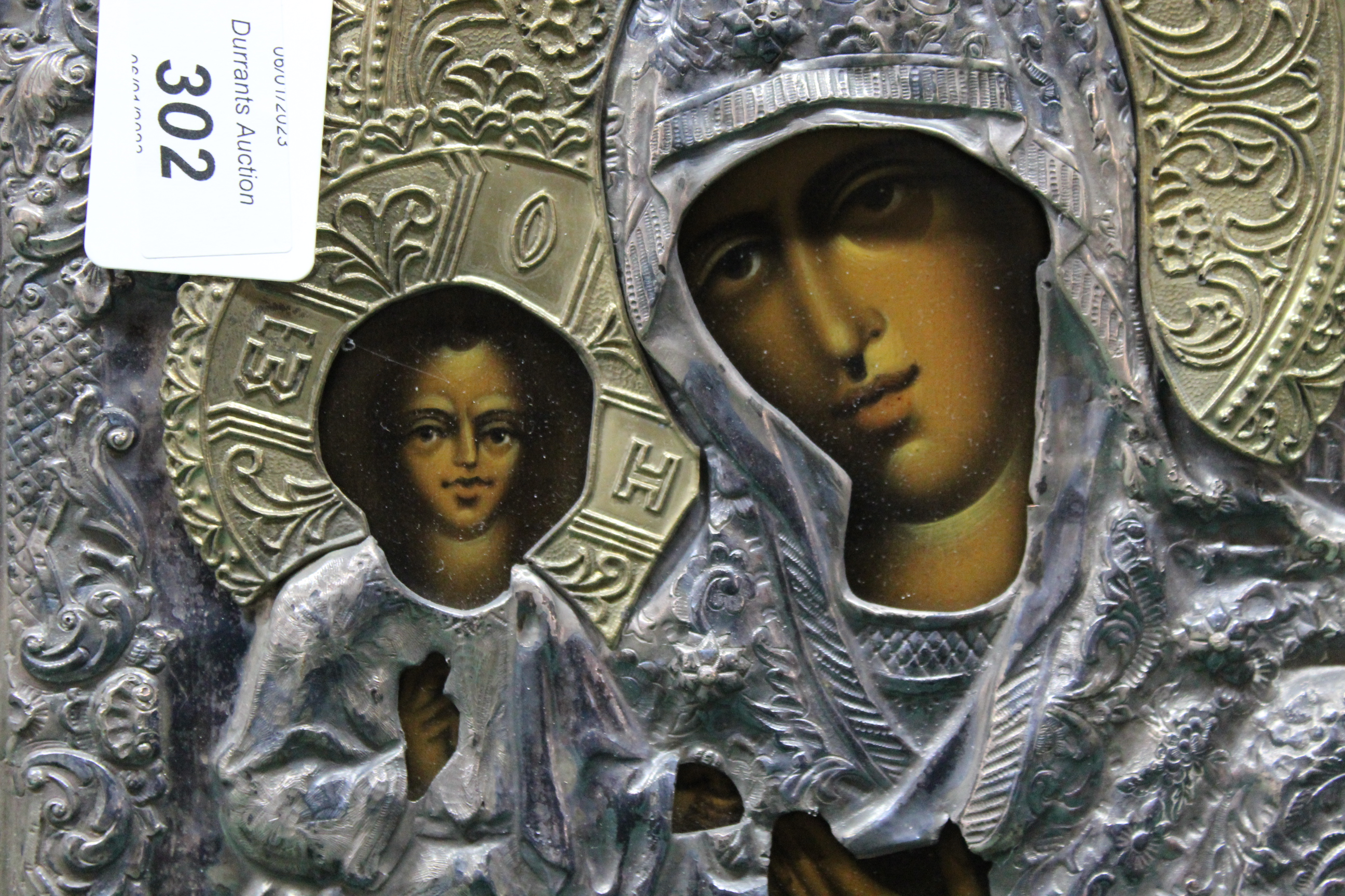 A Polish white metal cased religious icon of the Madonna and China, - Image 2 of 3