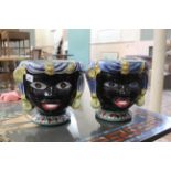 Two similar pottery jardinieres modelled in the form of African heads, one marked The Seahorse,