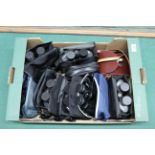 A box containing ten pairs of binoculars