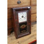A late 19th Century mahogany cased American wall clock by The Waterbury Clock Co.