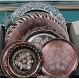 A small box of mixed copper plates and dishes
