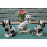 Three late 19th Century Staffordshire pottery dogs