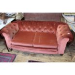 A late 19th Century two seater Chesterfield sofa