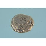 Possibly a gold stater coin,
