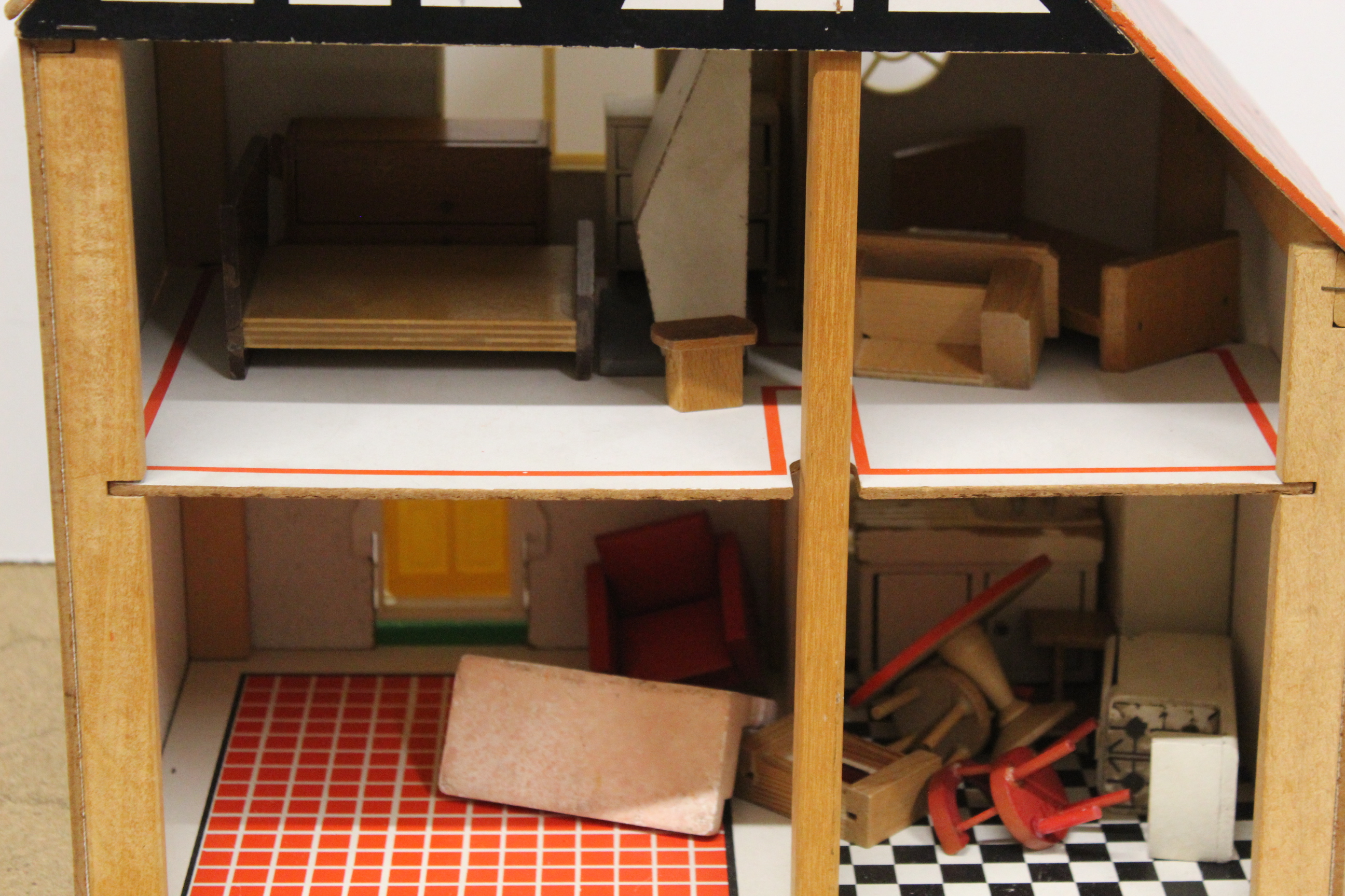 A vintage wooden and board constructed dolls house, - Image 2 of 3