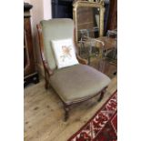 A 19th Century oak framed upholstered lady's chair