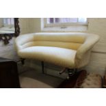 A mid 19th Century upholstered sofa on turned legs and castors