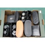 A box containing ten pairs of binoculars