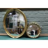 Two gilt framed mirrors,