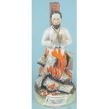 A Staffordshire pottery figurine of Archbishop Cranmer burning at the stake at Oxford 1556 in the