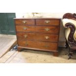 A late 18th Century mahogany five drawer chest on offset bracket feet,