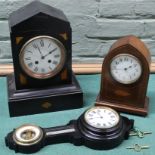 A slate cased mantel clock,