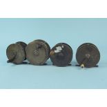 Four unnamed early brass plate wind reels