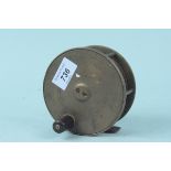 A Hardy 4 1/2" brass plate wind reel with filed foot