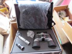 Box containing binoculars,