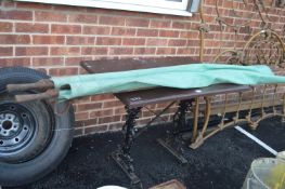 Table with Cast Iron Base and a Stretcher