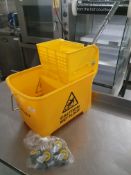 * yellow mop bucket