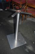 Seven Stainless Pedestal Table Bases (no tops)