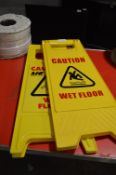 Two Wet Floor Signs
