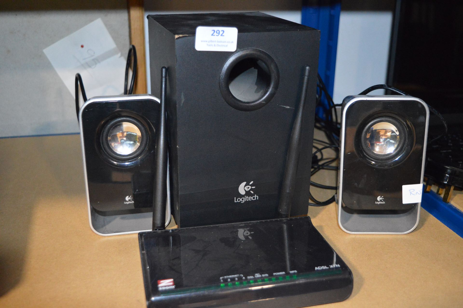 *Set of Logitech Speakers and a Zoom ADSL X70 Rout