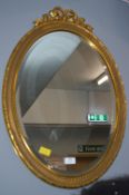 Oval Gilt Framed Beveled Edge Mirror