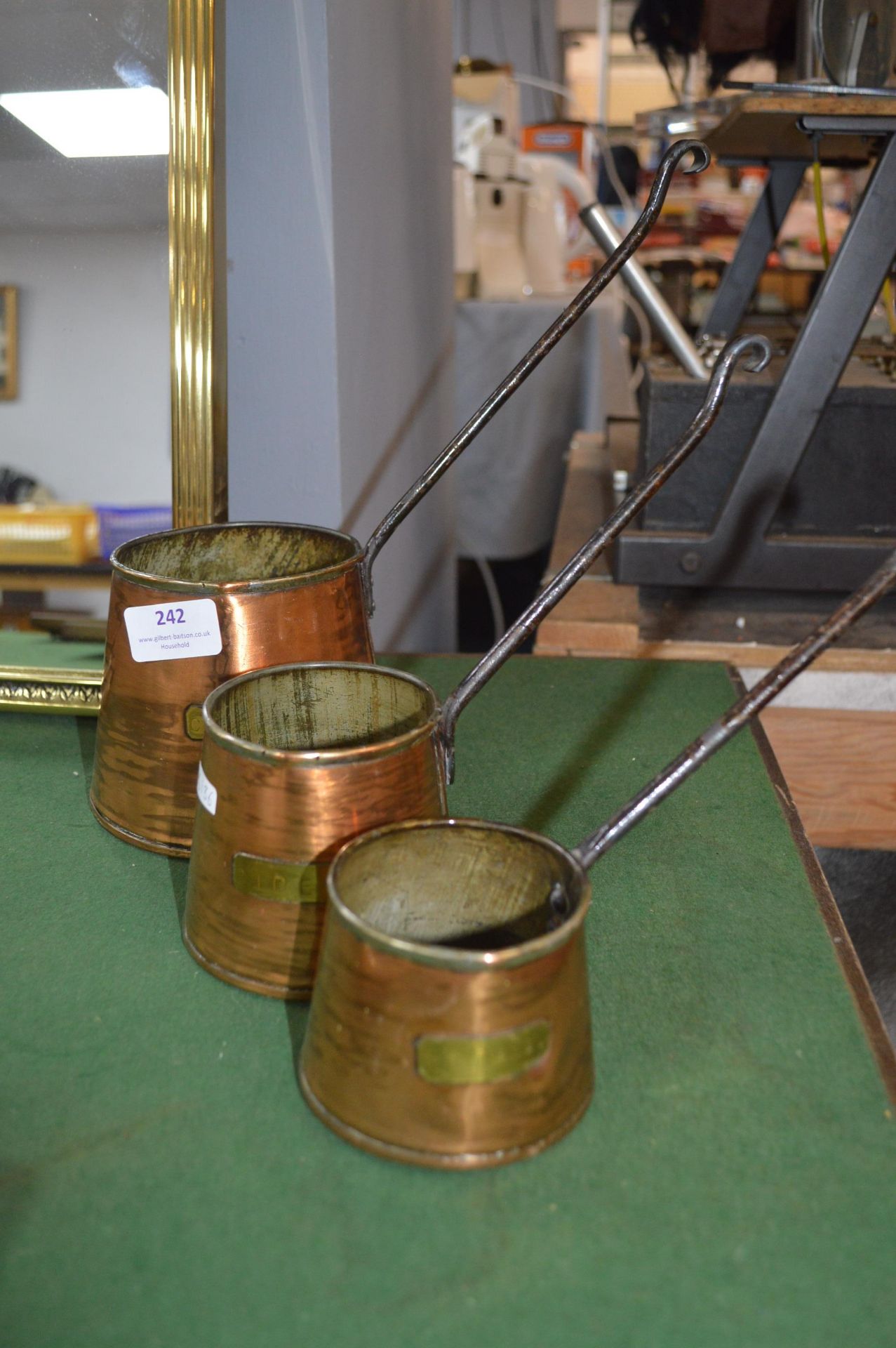 Three Copper Measuring Jugs