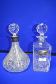 Two Cut Glass Decanters: One with Silver Collar, a