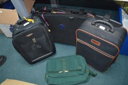 Three Travel Cases and a Holdall