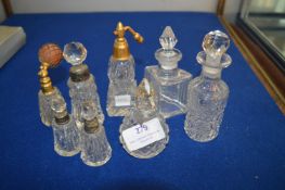 Three Cut Glass Scent Bottles with Hallmarked Silv