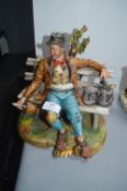 Large Capodimonte Figure: Tramp on a Bench