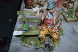 Capodimonte Figure of a Tramp on a Bench