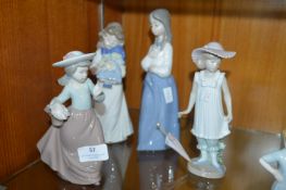 Four Lladro Nao Figurines