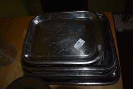 *Thirty-Two Assorted Stainless Steel Trays
