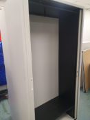 * upright Tambour cupboard with internal shelf and hanging rail