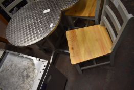 Circular Stainless Steel Table with Two Wooden Cha