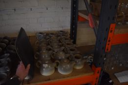 *Eighteen Goodson Vitrified Stoneware Teapots (som
