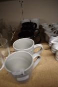 Quantity of Black and Grey Mugs